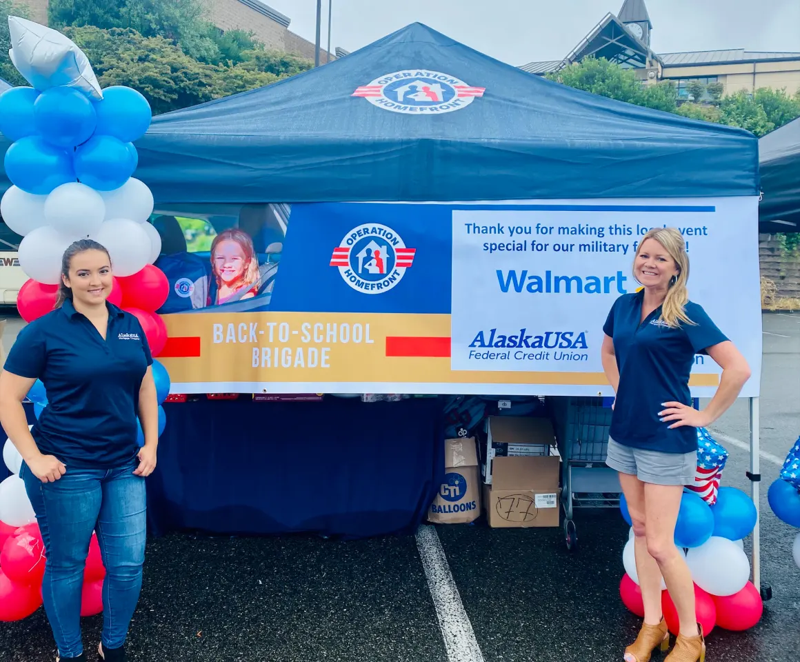 Two Alaska USA employees at the Operation Homefront event